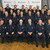 mehrere Feuerwehrler stehen in einer Gruppe zusammen